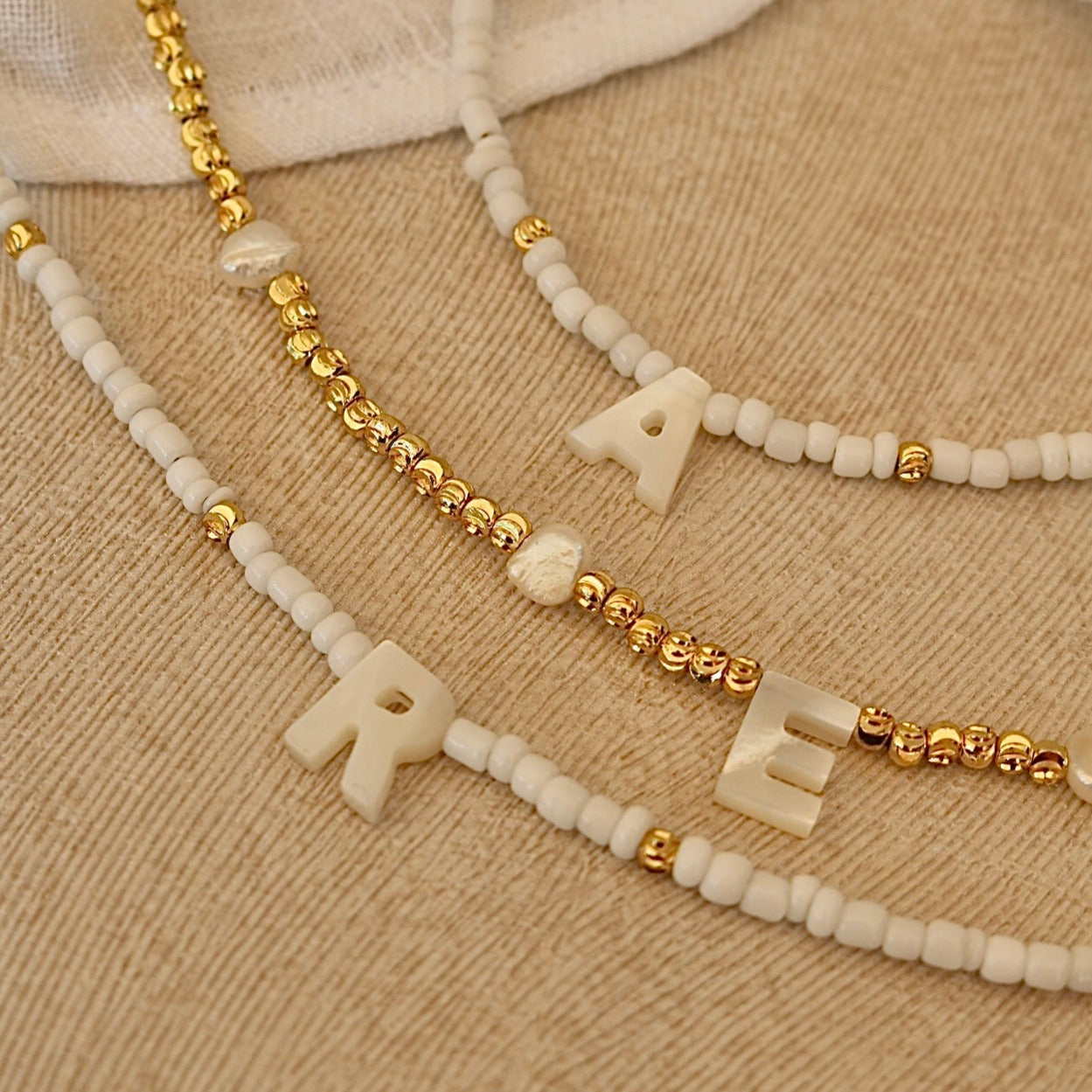 CLARA SHELL INITIAL LETTER NECKLACE IN 18K GOLD