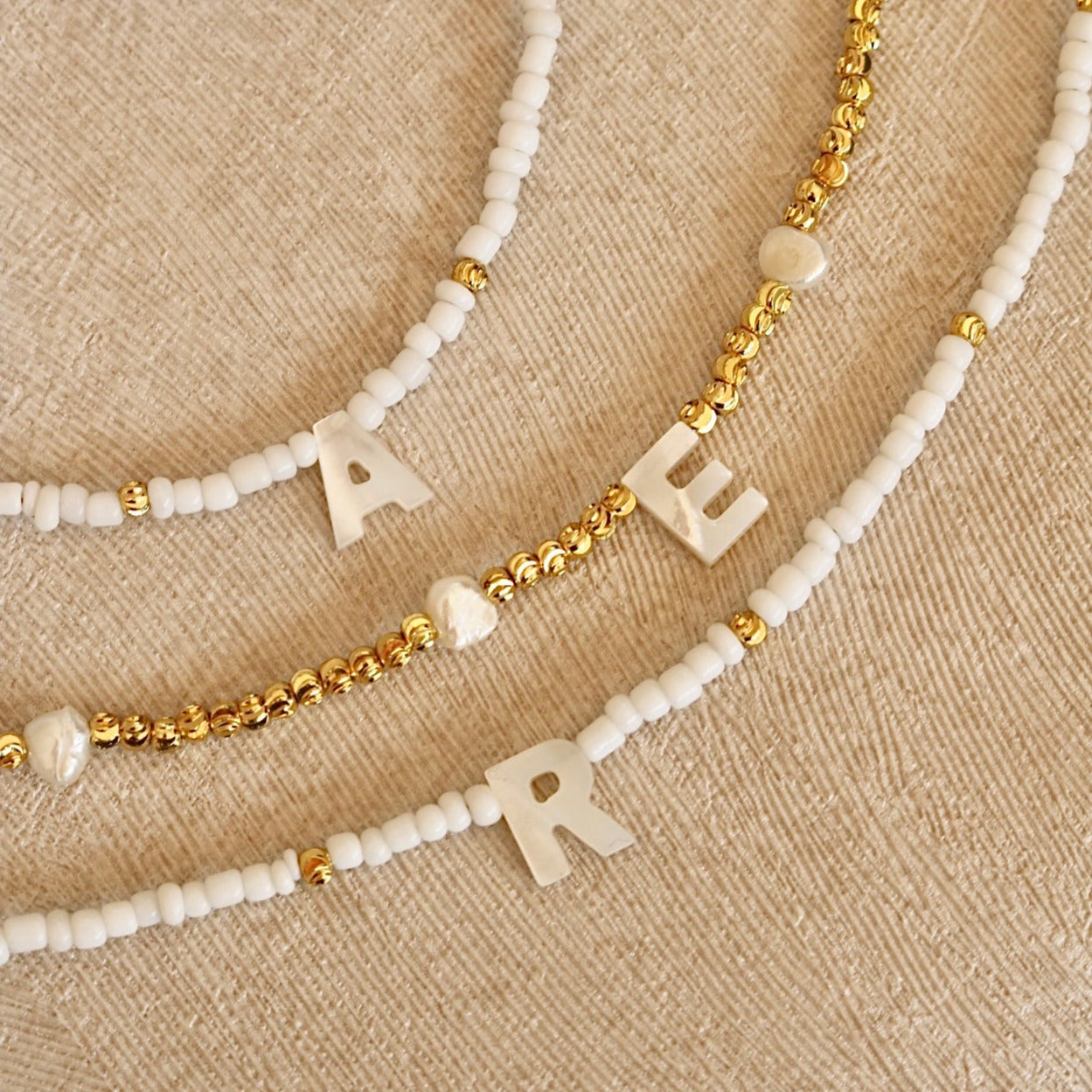 CLARA SHELL INITIAL LETTER NECKLACE IN 18K GOLD