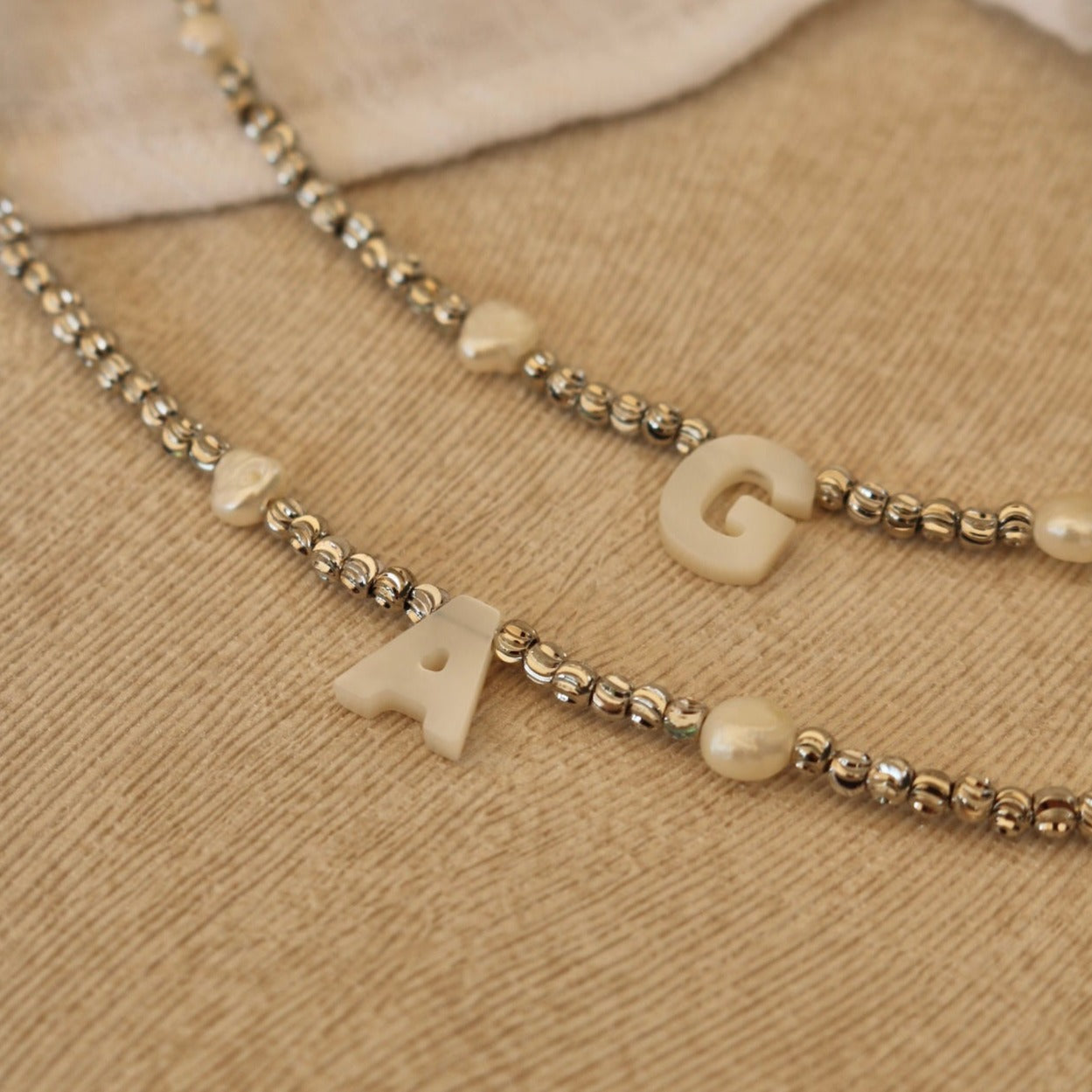 POSEY SHELL INITIAL LETTER NECKLACE IN PLATINUM