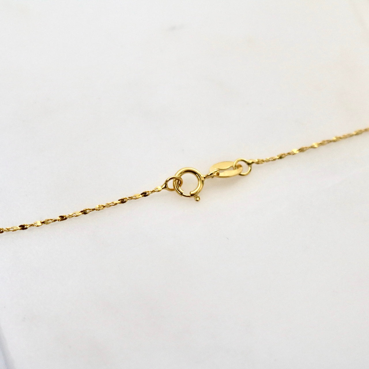 SNOWFLAKE NECKLACE IN 18K GOLD