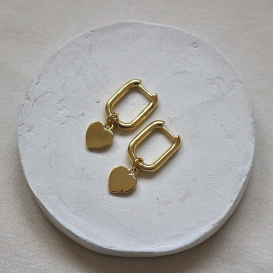 OVAL HOOPS WITH DETACHABLE HEART IN 18K GOLD