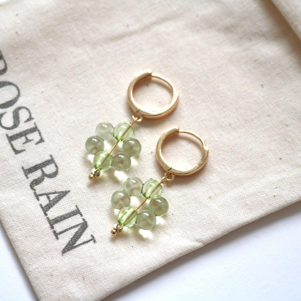 GREEN FLOWER POWER HUGGIE EARRINGS IN 18K GOLD