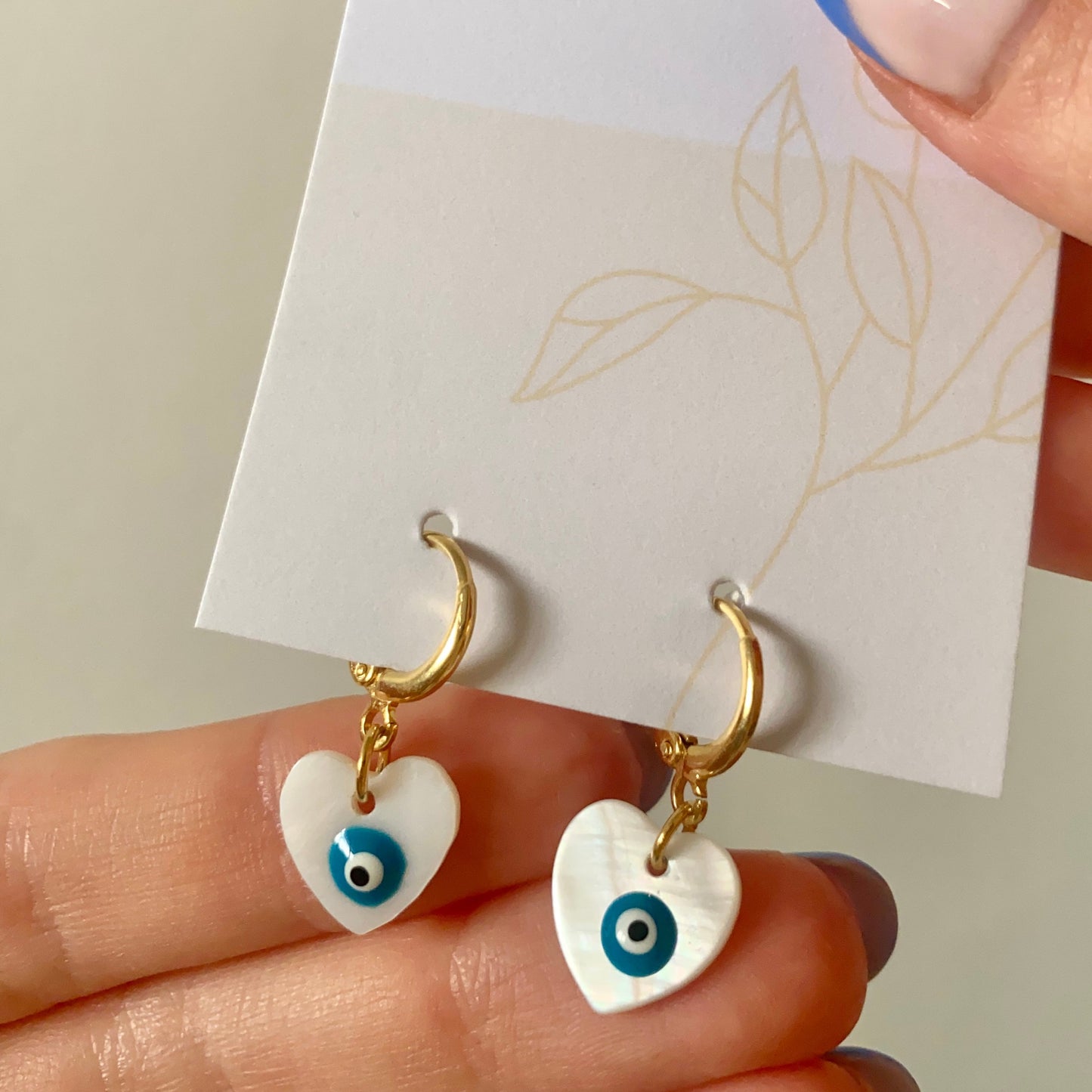 EVIL EYE HEART FRESHWATER SHELL HUGGIE EARRINGS IN 18K GOLD