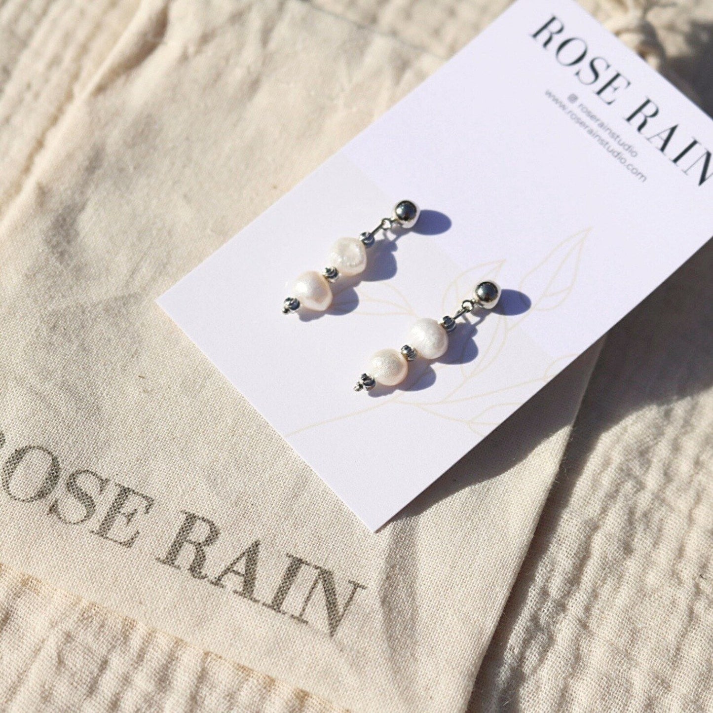 SUNRISE FRESHWATER PEARL STUDS IN PLATINUM