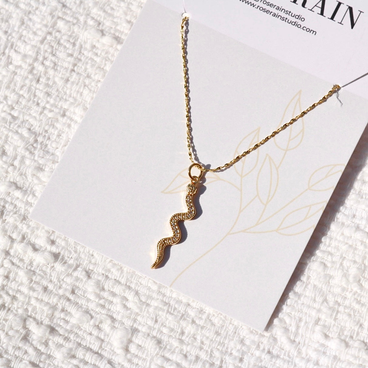 SNAKE PENDANT NECKLACE IN 18K GOLD